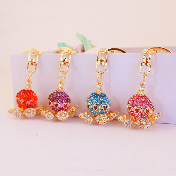 Orange Rhinestone Pumpkin Carriage Keychain With Heart Cutouts
