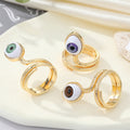 Gold Tone Eyeball Snake Wrap Adjustable Rings in Three Iris Colors view 1