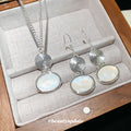 Silver Spiral Disc Oval Cabochon Necklace Earrings view 4