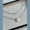 Pale Blue Beaded Necklace with White Shell Drops in Two Coastal Styles view 4