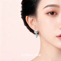 Silver Tone Floral Stud Earrings With Detachable Leaf And Blue Vase Drops view 4