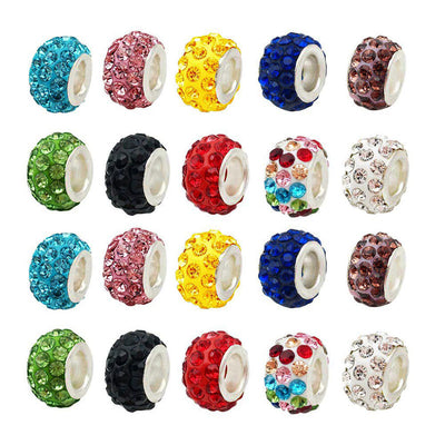 Metallic cake beads arranged on a light background