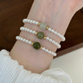 White Pearl Stretch Bracelet Green Jade Center Bead view 2