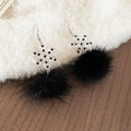 Snowflake Faux Fur Pom Pom Drop Earrings in White and Black view 7