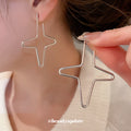 Wire Star Cross Stud Earrings With Polished Metal Tone Details view 3