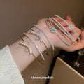 Silver Tone Multirow Open Cuff With Bow Or Round Crystal Center view 1