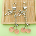 Cherry Charm Keychains Featuring Pink Cherry Across 28 Pictured Variations view 1