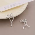 Hammered Ribbon Bow Gold and Silver Long Stud Earrings view 3