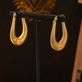 Layered Coil U Hoop Earrings in Gold and Silver Tone view 4