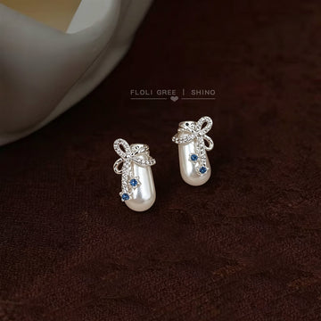Silver Tone Bow White Potion Bottle And Blue Stone Stud Earrings