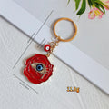 Red and Navy Rose Blue Evil Eye Metal Keychains in Two Styles view 4