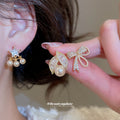 Gold Tone Bow and Pearl Stud Earrings in Three Designs view 2