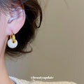 Gold Polished Hoop Earrings with Large White Pearl Drops view 3