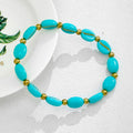 Oval Glass Bead Stretch Bracelet with Gold-Tone Spacers view 4