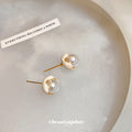 White Pearl Flower Stud Earrings with Gold Tone Trim view 4