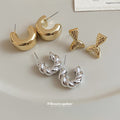 Twisted C Hoop Earrings in Mixed Gold and Silver Tones view 3