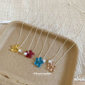 Translucent Flower Pendant Necklaces in Four Bright Colors view 3