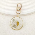 Gold Tone Round Pressed Daisy Resin Clip Keychains view 11