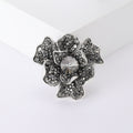 Layered Black Crystal Flower Brooch With Faceted Center view 1