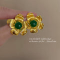 Gold Textured Flower Stud Green Cabochon Center Earrings view 1
