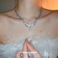 Silver Tone Crystal Wing Earrings And Necklace With Pearl Drops view 4