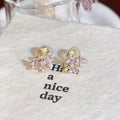 Purple Crystal Flower Earrings in Clip and Post Styles view 6
