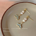 Gold Tone Pearl Drop Earrings With Whale Tail Charm Pendant view 6