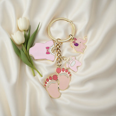 Front product photo of pink and blue baby elephant bottle and footprint charm keychain showing the pictured design arran