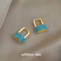 Gold Tone Aqua Clear Stone Padlock Huggie Hoop Earrings view 1