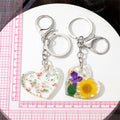 Silver Tone Heart Pressed Flower Resin Keychains in Five Designs view 5