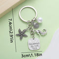 Starfish, Conch and Shell Charm Keychains Featuring Blue Shell Across 59 Variations view 4