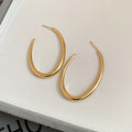 Tapered Open Hoop Earrings in Gold Tone or Silver Tone view 6