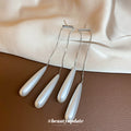Silver Tone Pearl Teardrop Threader Earrings with Polished Metal Details view 4