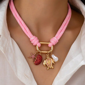 Shell Starfish Turtle And Pearl Charm Necklace In Gold Tone Metal