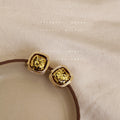 Gold Square Stud Earrings Crushed Foil Center Rope Frame view 1