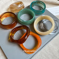 Wide Irregular Marbled Resin Closed Bangle In Eight Colors view 2
