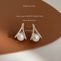 Gold Tone Clear Stone Pointed Frame Pearl Like Stud Earrings view 3