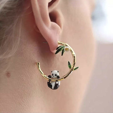 Gold Tone Panda Bamboo Hoop Earrings In A Polished Decorative Design