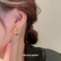 Rounded Hoop And Chain Tassel Earrings In Three Finishes view 2
