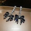 Black Bow Drop Earrings with Clear Crystal Trim and Pearl Accents view 4