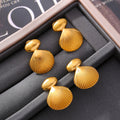 Seashell Drop Stud Earrings Gold And Steel Polished Metal view 4