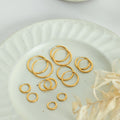 Gold Tone Plain Round Hoop Earrings Multiple Sizes Smooth Finish view 3