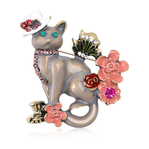 Gray enamel cat brooch with white hat and pink flowers on white