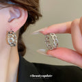 Crystal Interlocking Link Hoop Earrings in Gold and Silver Tone view 3