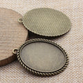 Oval Cabochon Settings in Two Antique Metal Finishes view 2