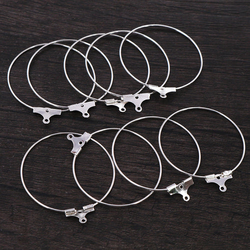 Grouped detail view of wire hoop earring findings in four finishes and six diameters