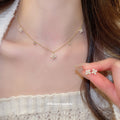 Gold Pearl Flower Station Necklace and Matching Stud Set view 1