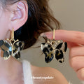 Gold Tone Tortoiseshell Butterfly Hoop Earrings Fashion Earrings view 1