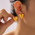 Puffy Heart Stud Earrings Gold Or Steel Titanium Finish view 1