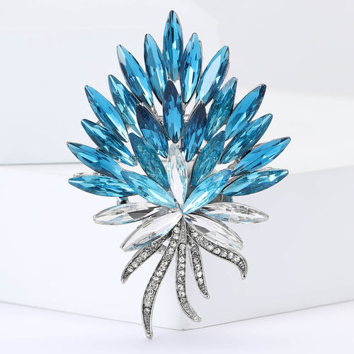 Angled display of radiating spray of pointed marquise stones above crystal-set stems
